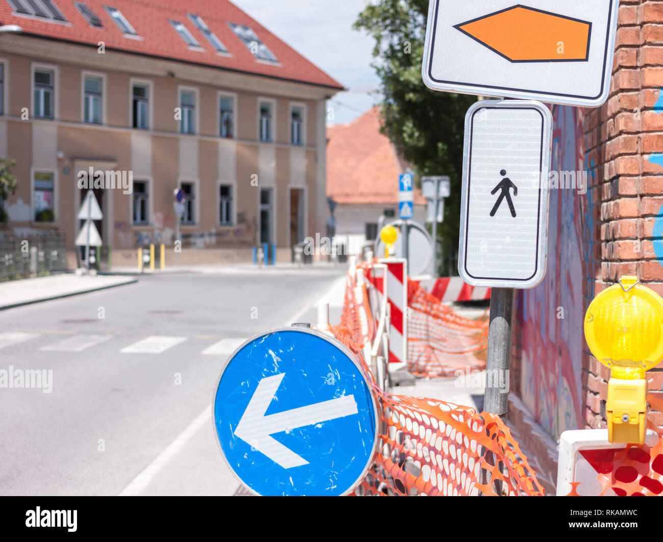 Pedestrian detour sign on sidewalk in Ljubljana Stock Photo