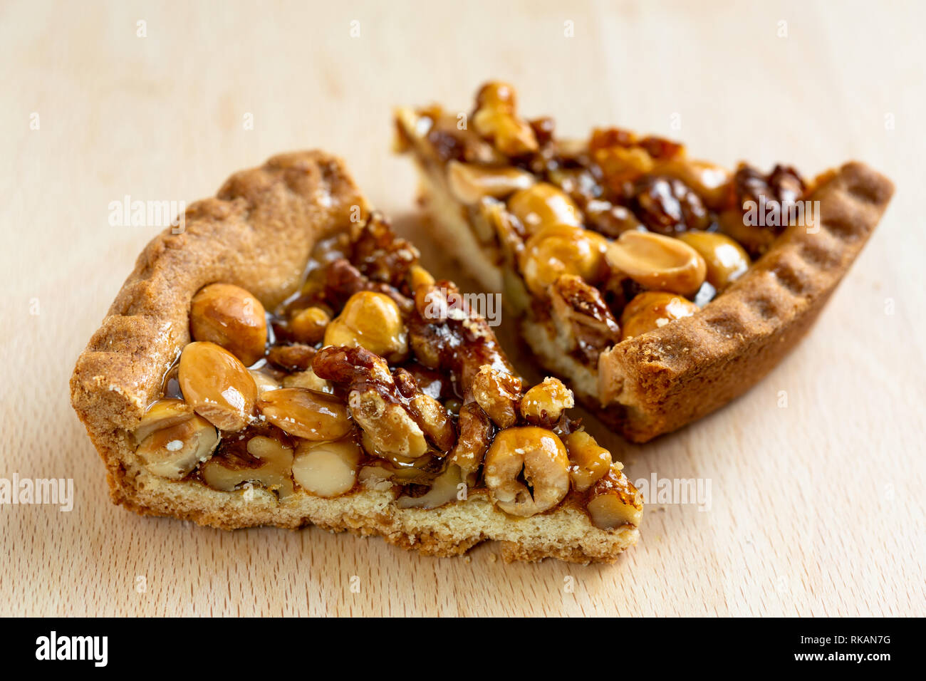 Two slices of tart with nuts Stock Photo