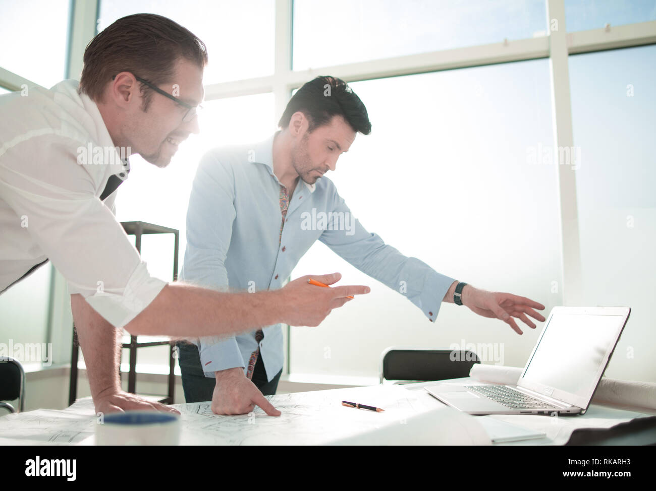 two architects developing a new project . the concept of professionalism. Stock Photo