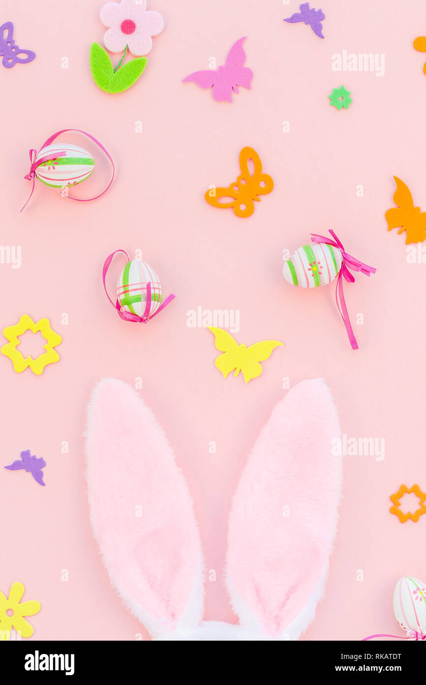 Creative Top view flat lay holiday composition Easter eggs bunny ears ...