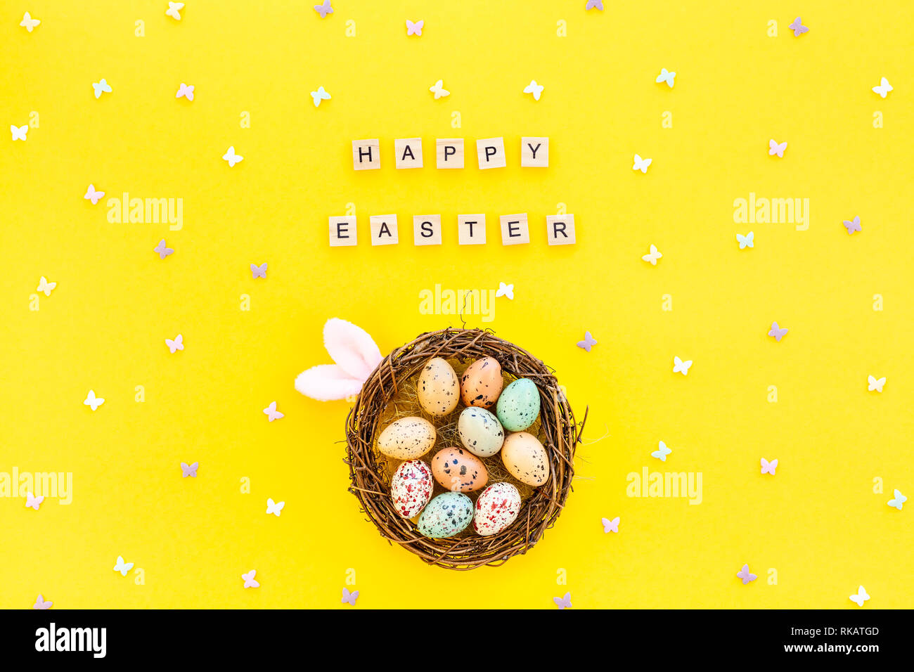 Creative Top view flat lay holiday composition Easter bunny ears eggs ...