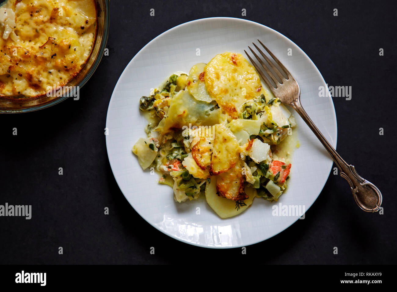 Fish pie with sliced potato topping Stock Photo