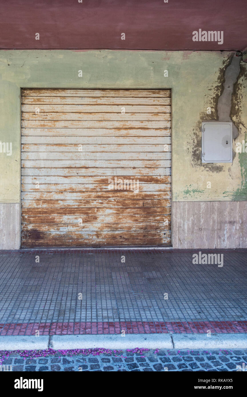 Closed shop, failed work activity, rusty shutter Stock Photo
