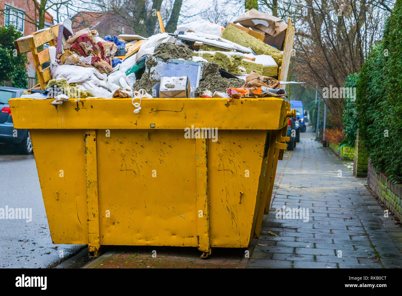 large container full of bulky waste, recycling concept, huge pile of