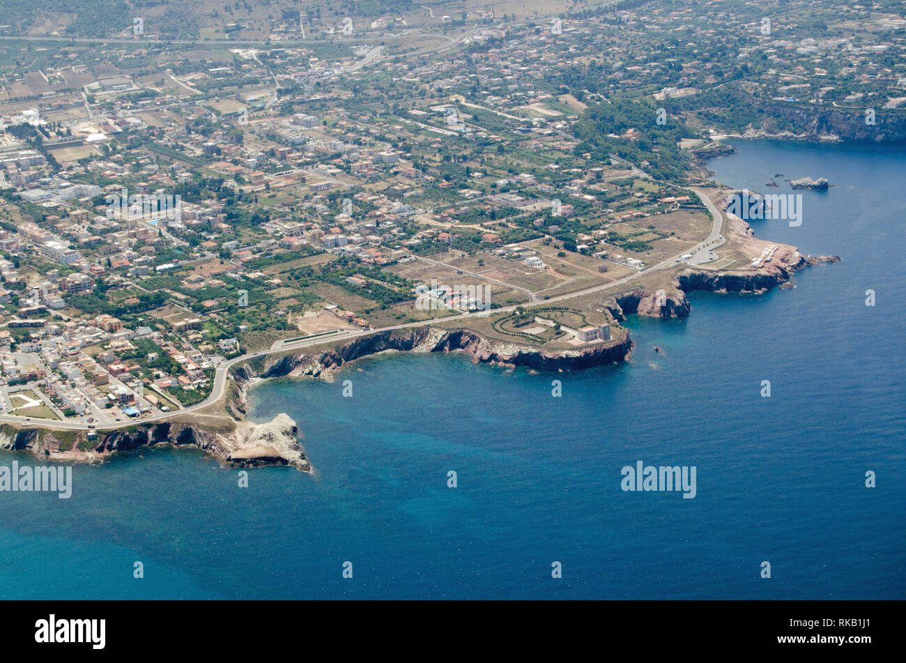 Aerial view of the rocky headland around Terrasini in the Palermo district of Sicily. In the middle is the historic Torre Alba, coastal defence tower  Stock Photo