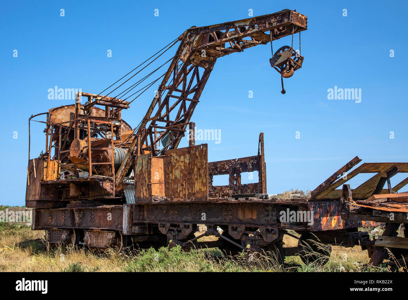 The old railway track crane in Mannez Quarry in Alderney Stock Photo