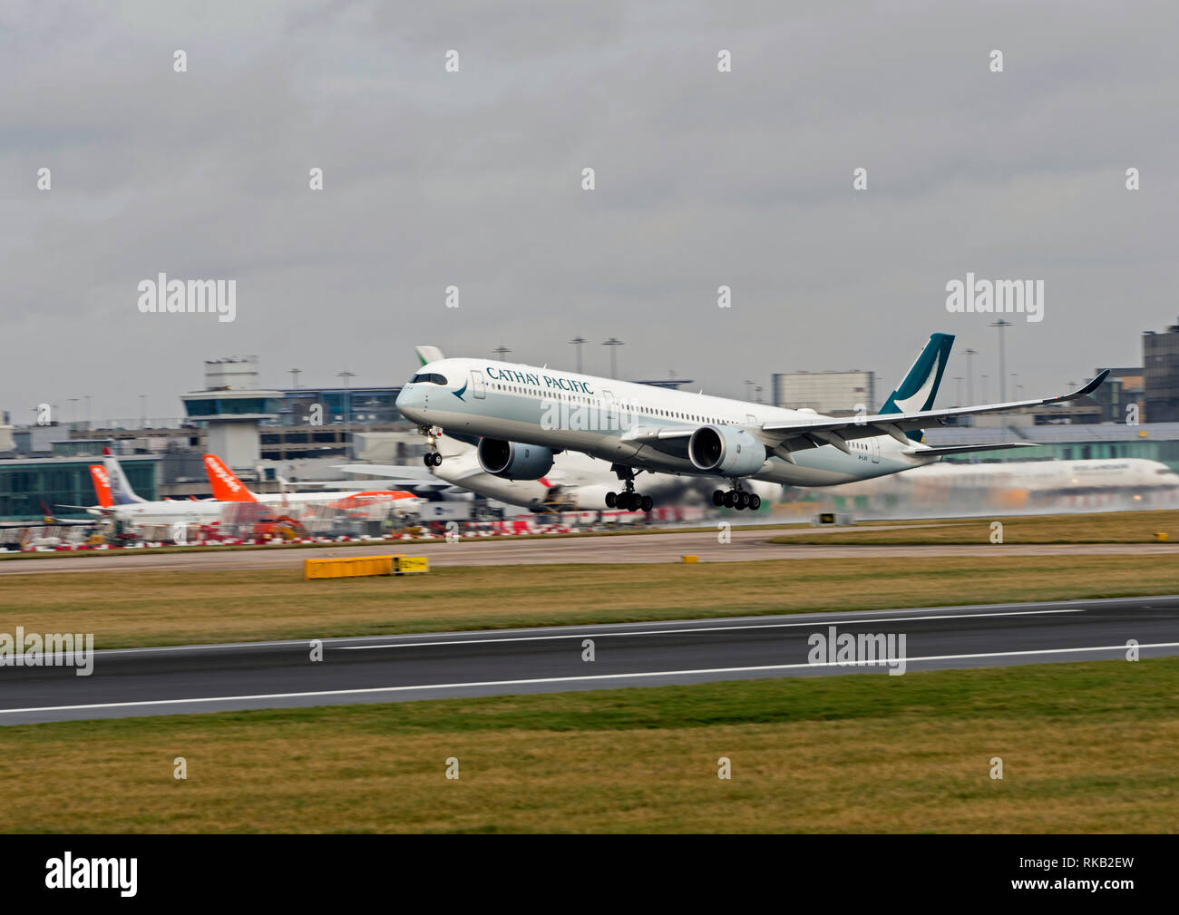 Cathay Pacific, Airbus, A350-1000, B-LXG take off at Manchester Airport Stock Photo