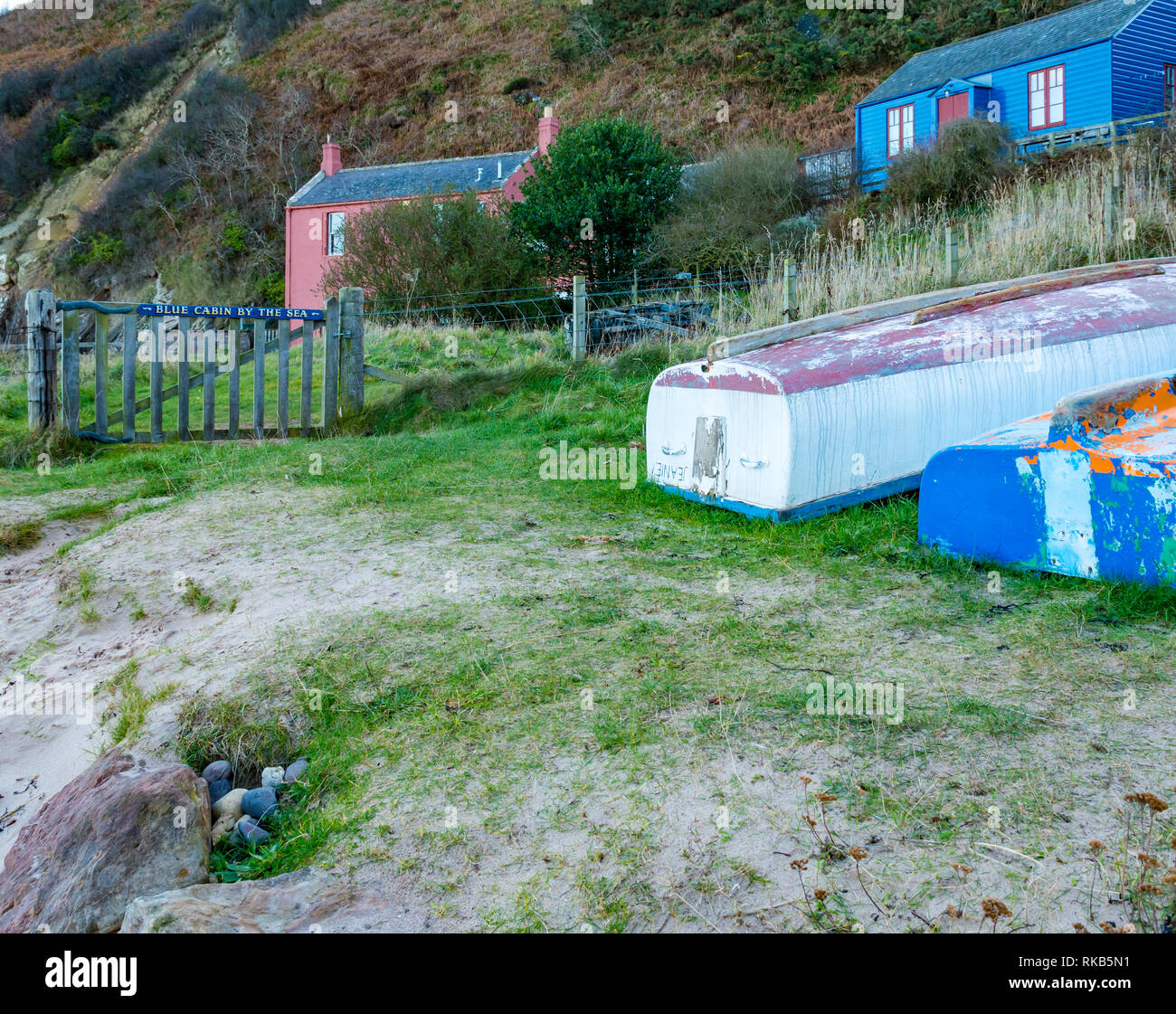 Blue Cabin by the Sea cottages, Cove harbour, Berwickshire, Scottish Borders, Scotland, UK Stock