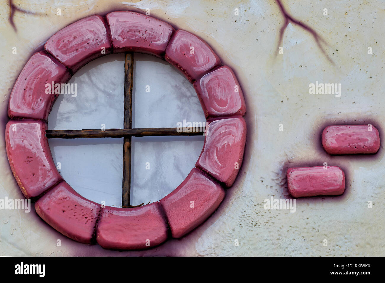 front view of rounded window on artificial facade Stock Photo - Alamy