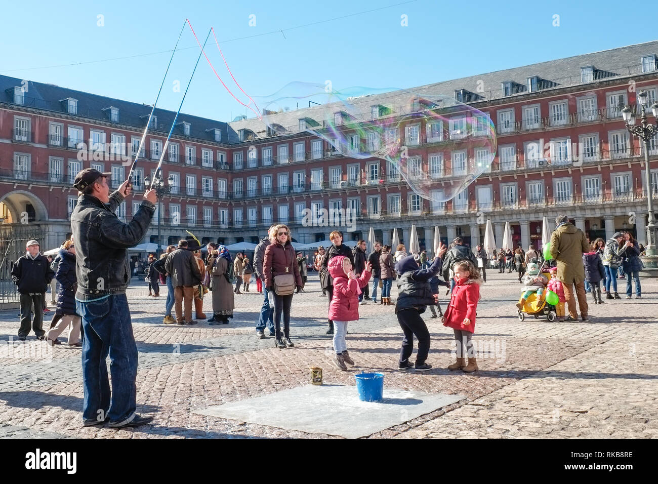 Street entertainer, making bubbles, Plaza Mayor, Madrid Stock Photo