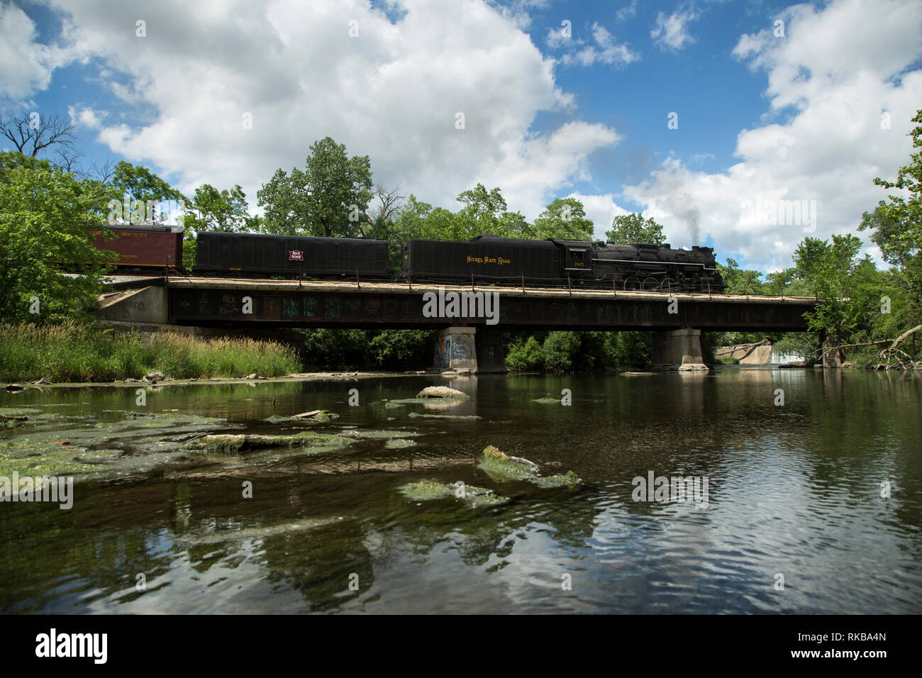 Nickel Plate Road steam engine #765 speeds over Hickory Creek near Joliet, Illinois. Stock Photo