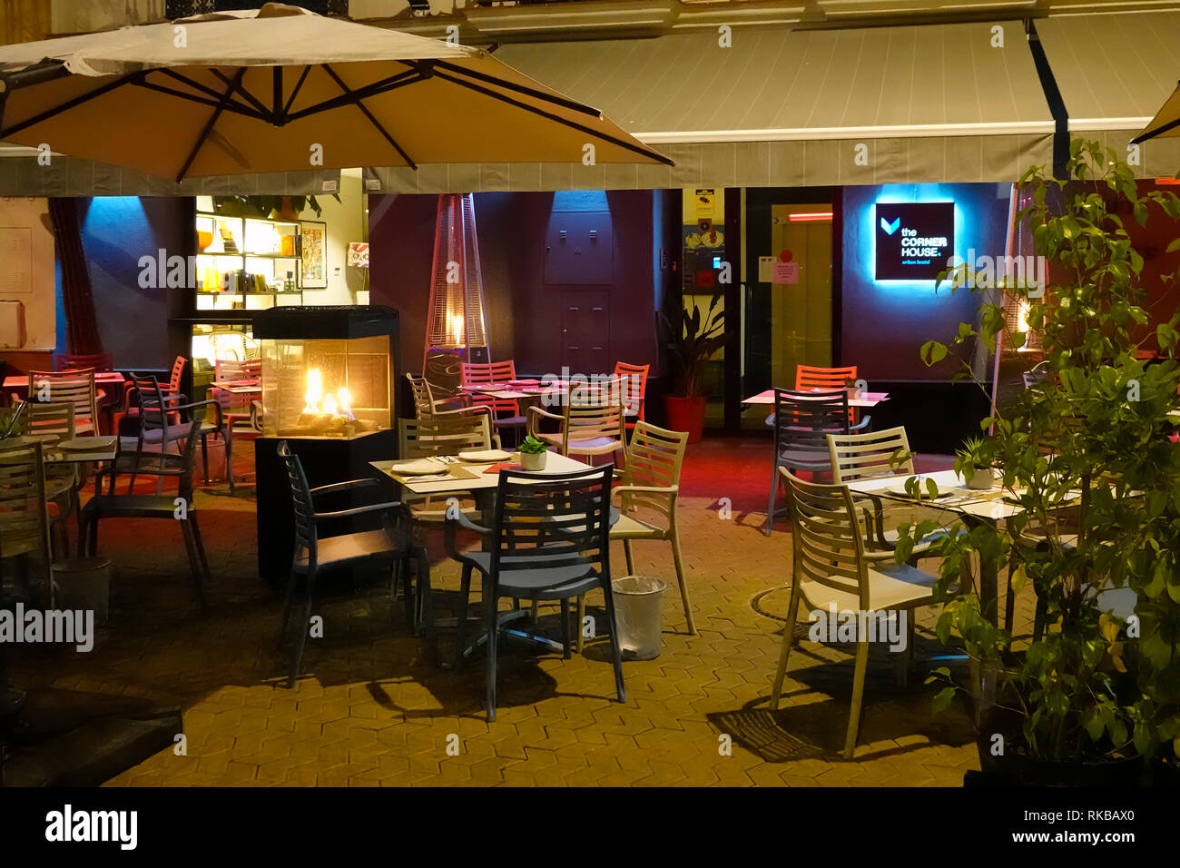 Empty tables and chairs await the evening's customers at The Corner House restaurant and bar in