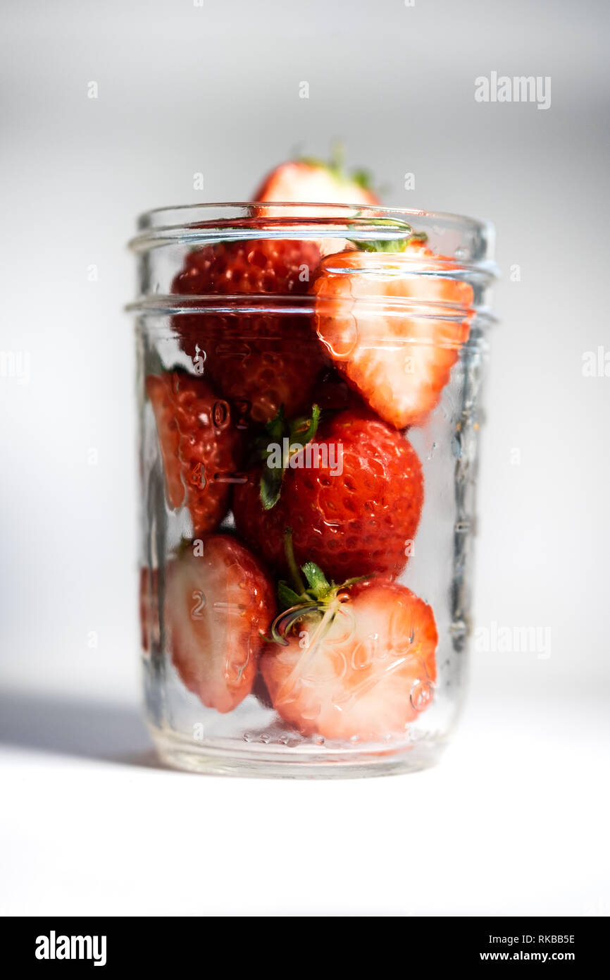 Strawberries cut in half hires stock photography and images Alamy