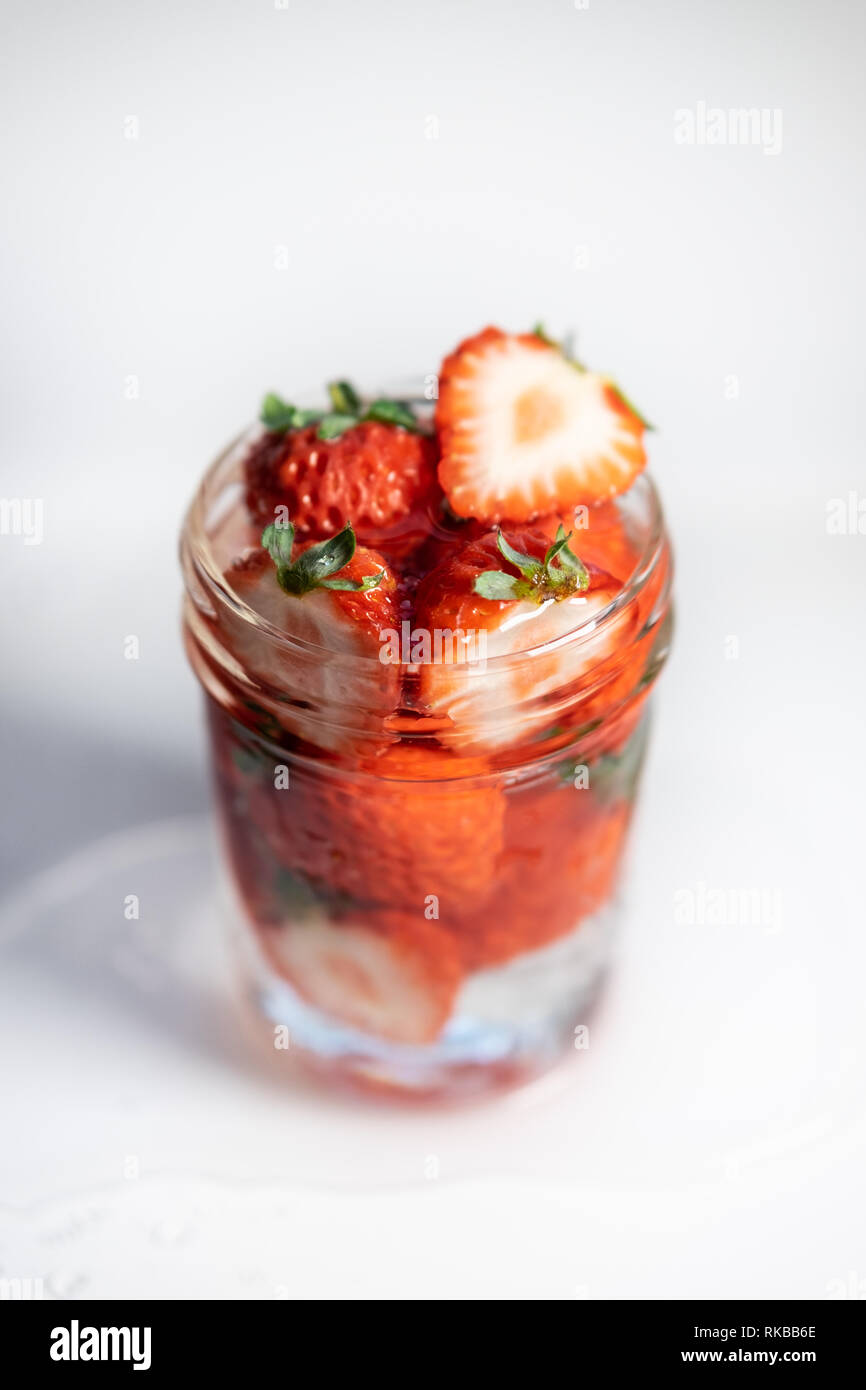 Strawberries in a jar with water hi-res stock photography and images ...