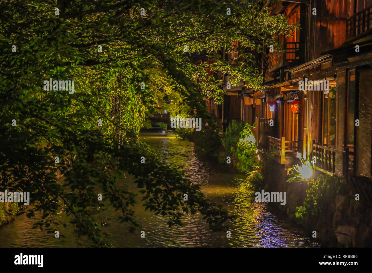 Romantic night view of a tree and river at Gion, Kyoto's most beautiful district Stock Photo