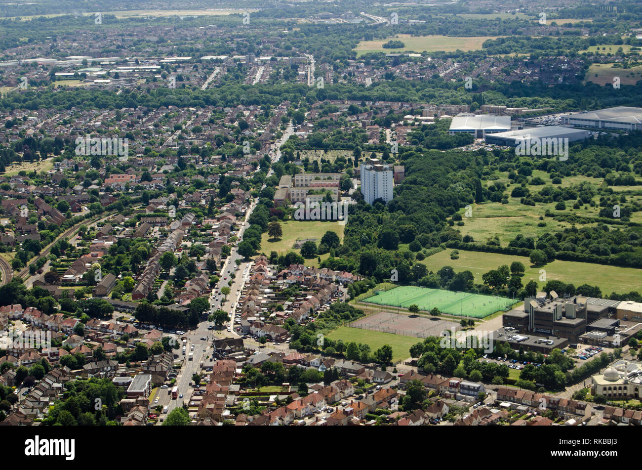 Aerial View of Hounslow in West London on a sunny summer afternoon.  Hounslow Heath is to the right hand side. Stock Photo