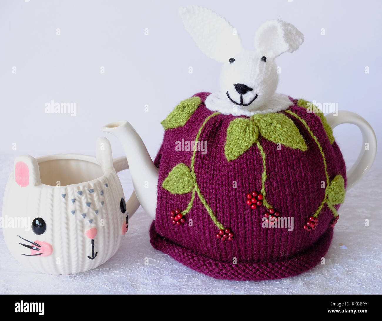 Handknitted tea cosy in the shape of a Bunny Rabbit Stock Photo