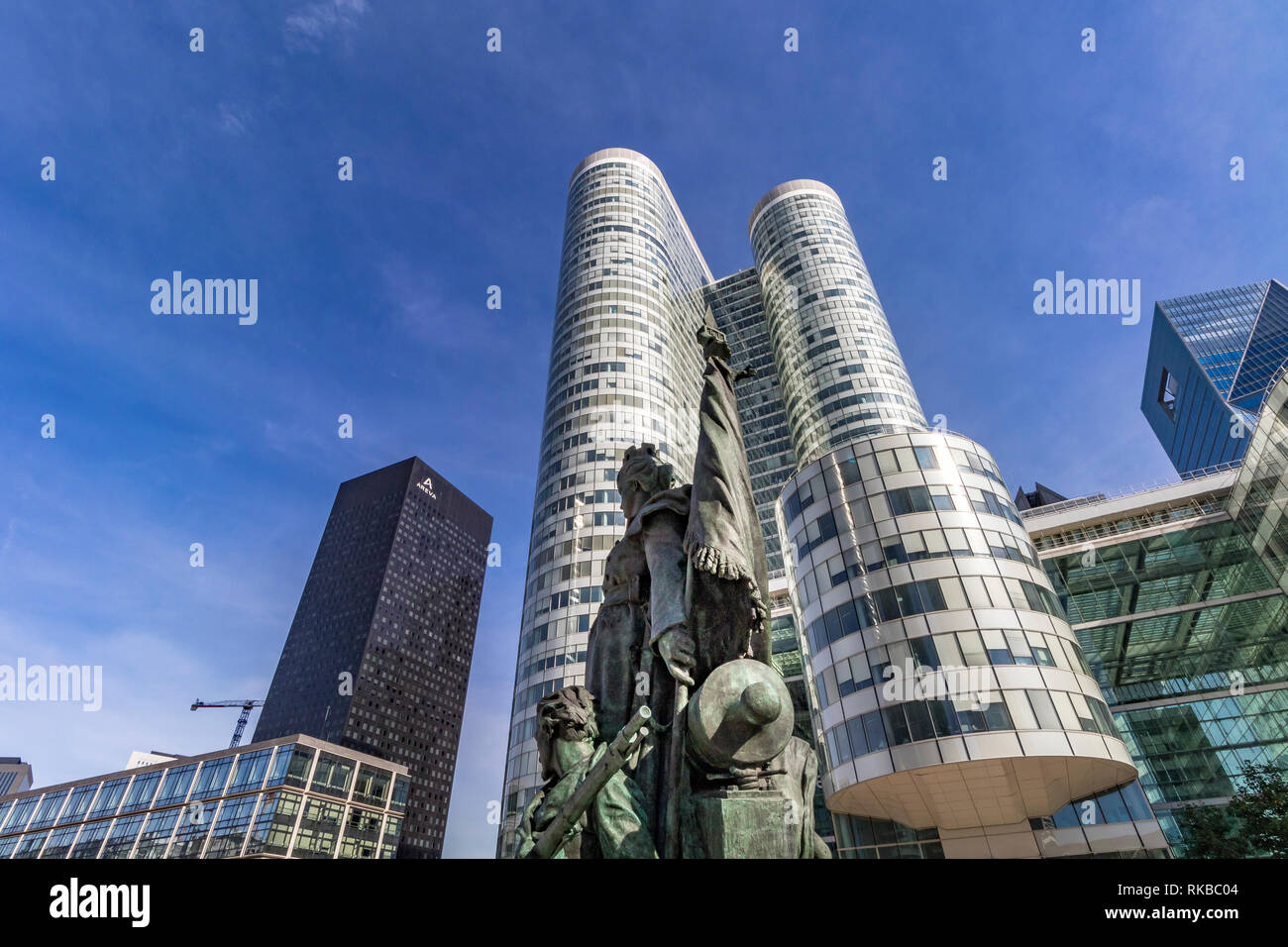 La Défense bronze monument to the defenders of Paris in 1870 by Louis-Ernest Barrias stands in front of the Cœur Défense building , La Defense , Paris Stock Photo