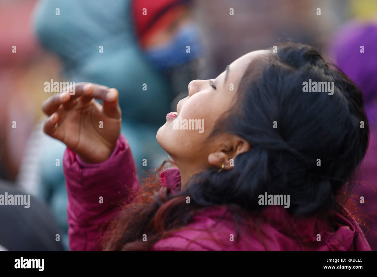 A girl seen worshiping Goddess of education Saraswati at the temple during the festival. Shreepanchami festival is dedicated to goddess of education Saraswati, devotees specially students worship and pray for knowledge and education. Shreepanchami also called Basanta Panchami marks the arrival of spring session in Nepal. Stock Photo