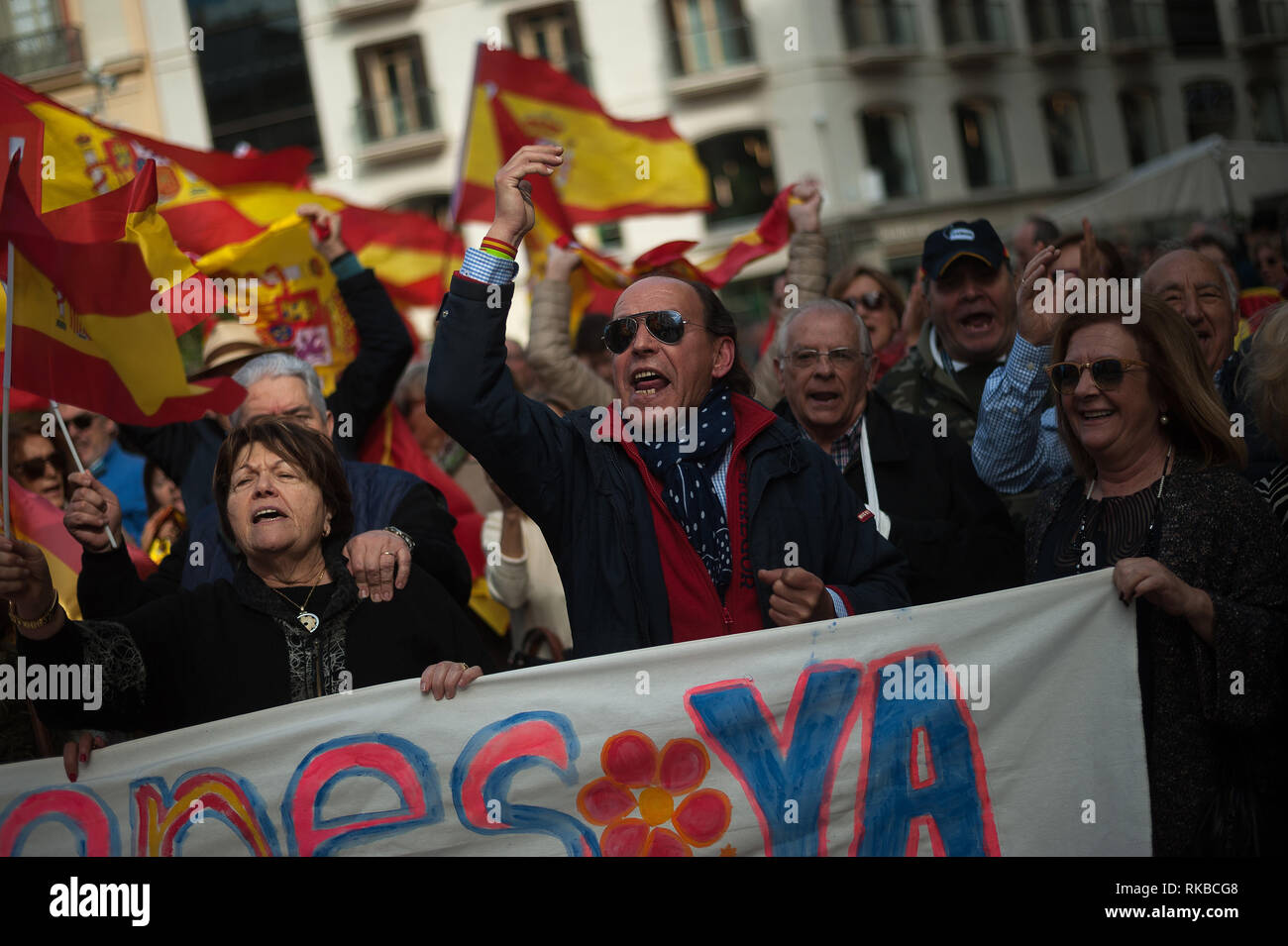 A supporter of the unite between Spain and Catalonia called by right parties, is seen shouting slogans as he takes part in a demonstration against the Spanish government of Pedro Sánchez. Stock Photo