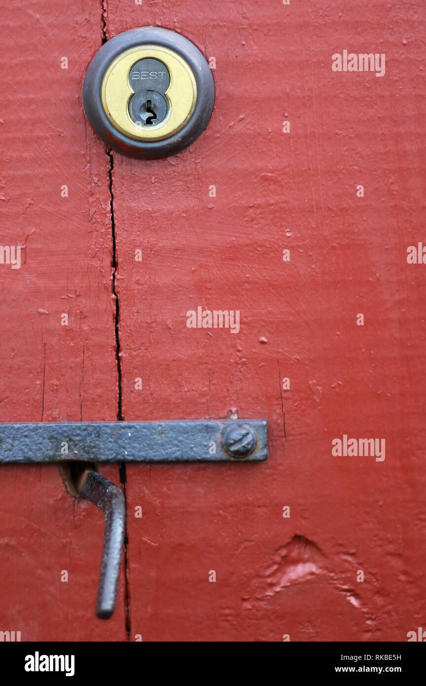 The Red Door Is Locked And Cannot Open Without A Key Stock Photo