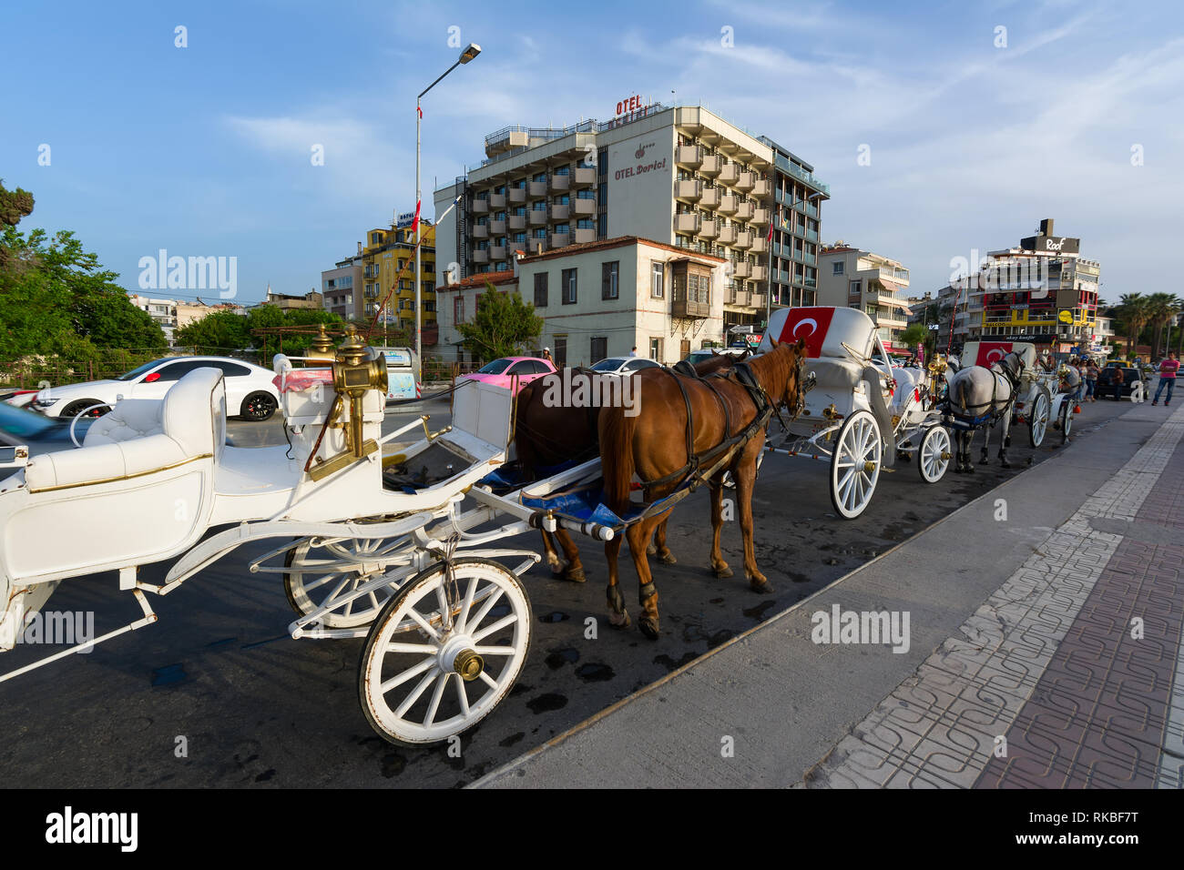 KUSADASI, TURKEY - MAY 23, 2015: Horse carriage on the street of Kusadasi, Turkey. Stock Photo