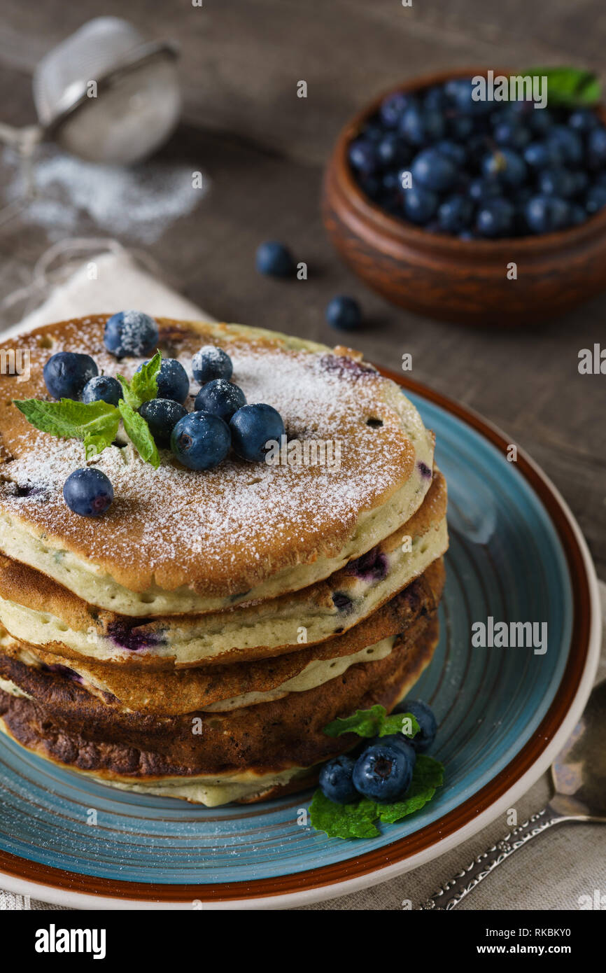 Pancakes Raspberry Blueberries Mint Pancakes with blueberries, mint and powdered sugar Stock Photo - Alamy