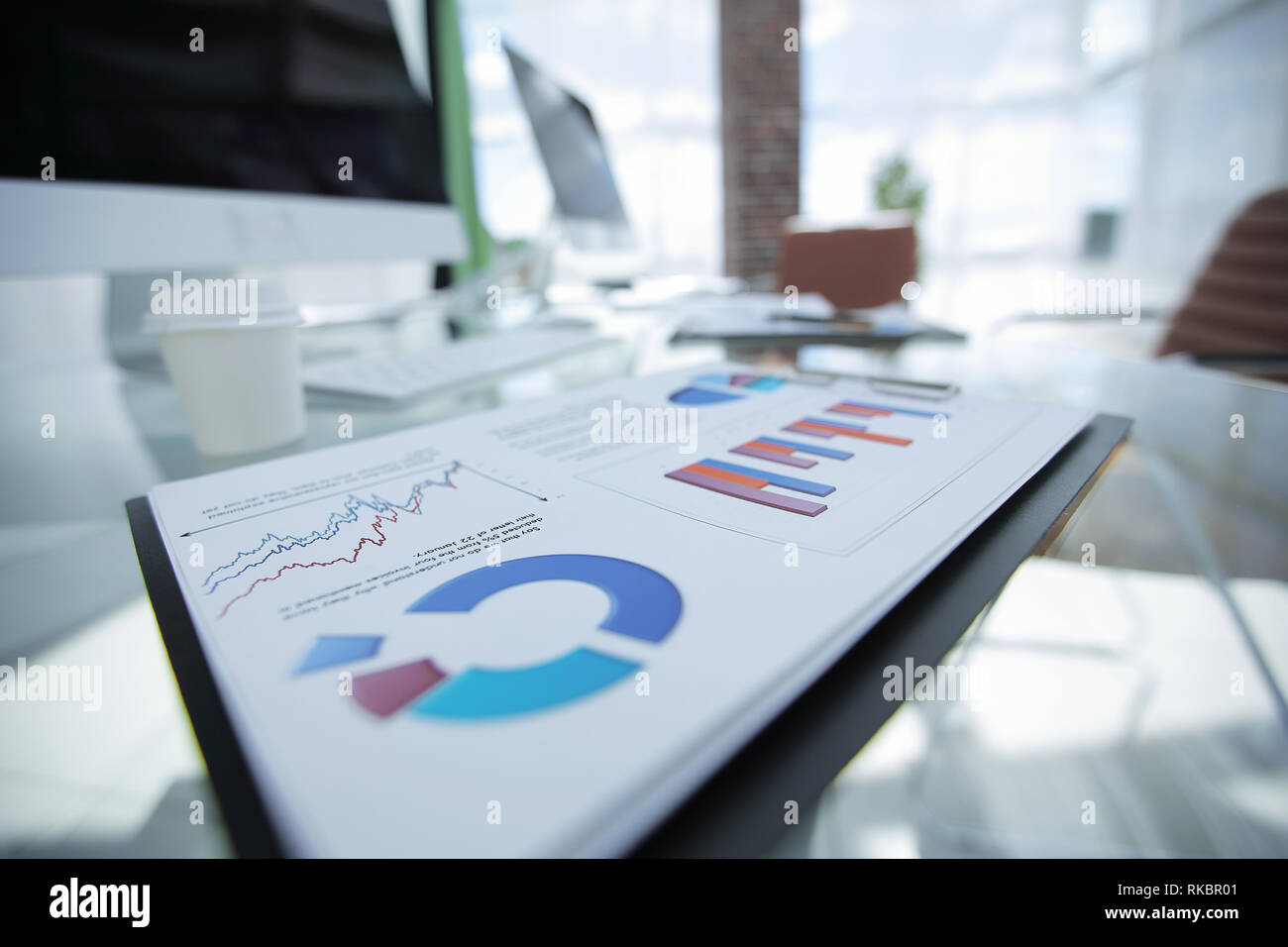 Financial Table Image closeup.financial chart on the table from a businessman Stock Photo - Alamy