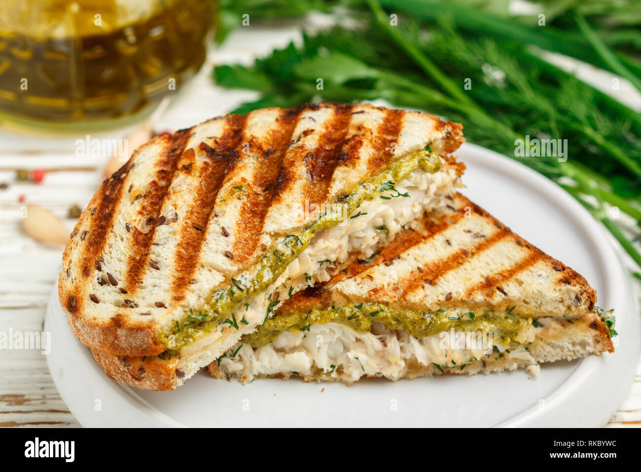 Gourmet Breakfast. Sandwich with white fish (cod, Pollock, nototenia ...