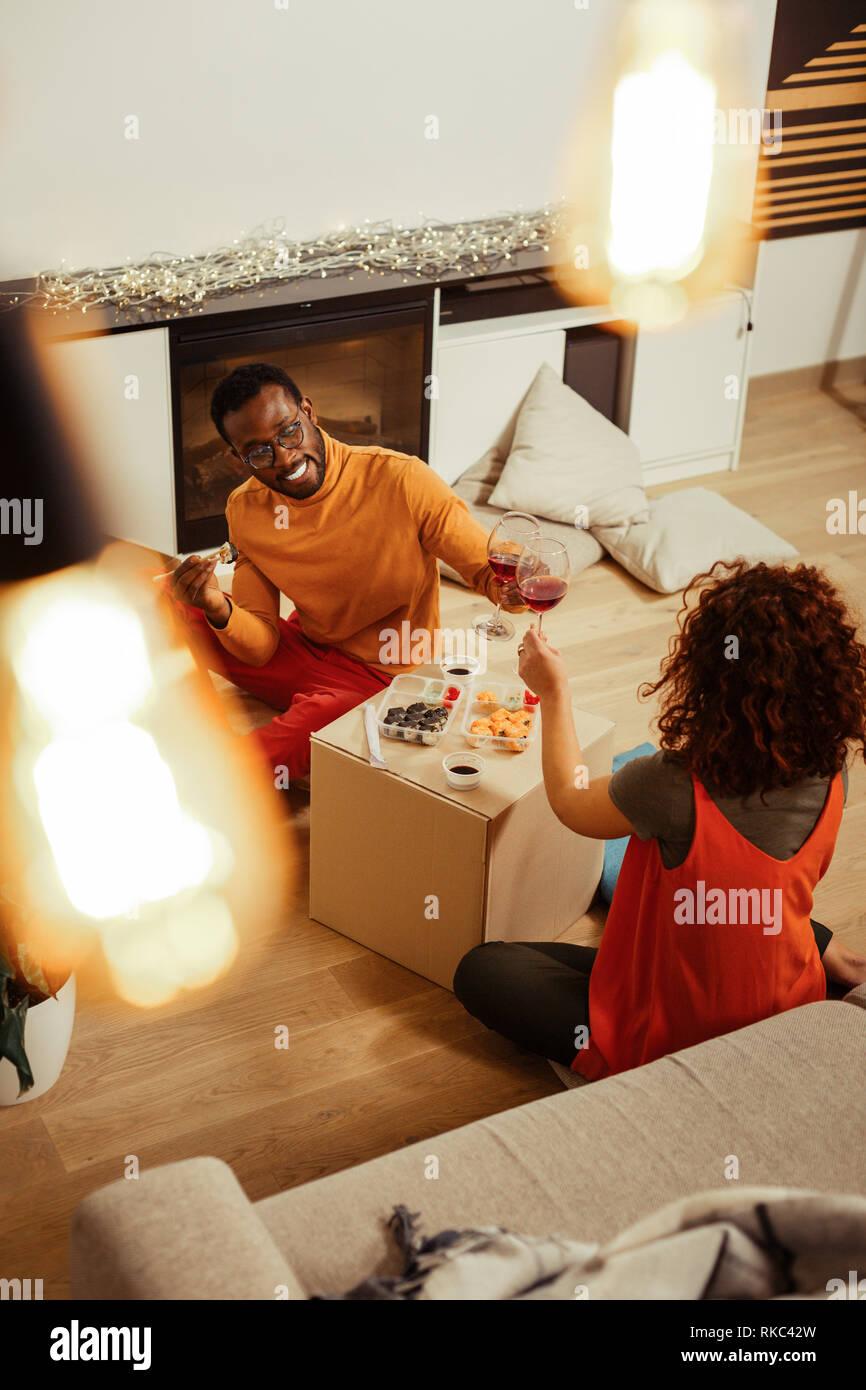Happy just married couple celebrating moving to new house Stock Photo ...