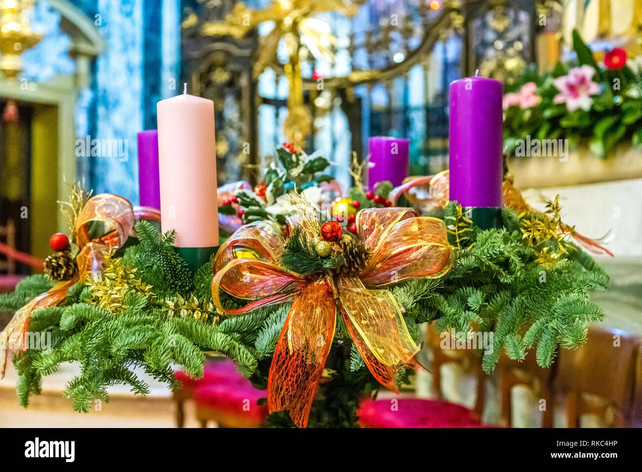 red ribbons and green needles in Christmas decorations in a church ...