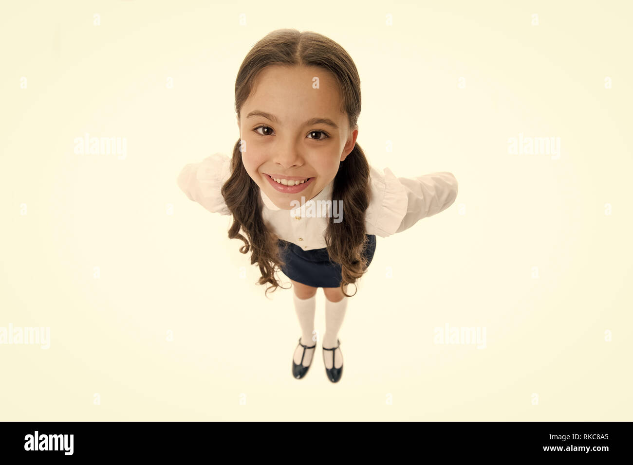 Happy Schoolgirl With Long Hair Isolated On White Little Girl Smiling In School Uniform Top View Cute Child With Adorable Smile Beauty Salon Look Great All Year Round Stock Photo Alamy