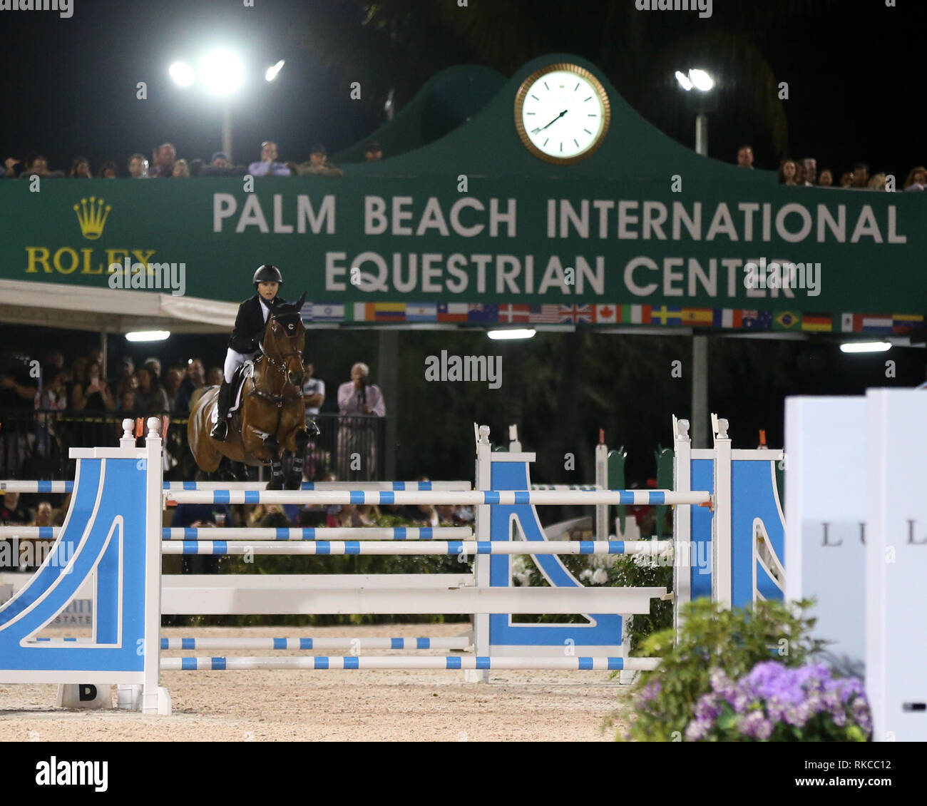 WELLINGTION, FL - FEBRUARY 09: SATURDAY NIGHT LIGHTS: Georgina Bloomberg participates in Class 101 - FEI CSI5* $391,000 Fidelity Investments Grand Prix where the winner was Martin Fuchs (Swiss) second place was Kent Farrington (USA) and third was Conor Swail (IRE). The Winter Equestrian Festival (WEF) is the largest, longest running hunter/jumper equestrian event in the world held at the Palm Beach International Equestrian Center. Georgina Leigh Bloomberg is the owner of the equestrian team New York Empire; a professional equestrian; and a philanthropist. She is the daughter of Susan Brown an Stock Photo
