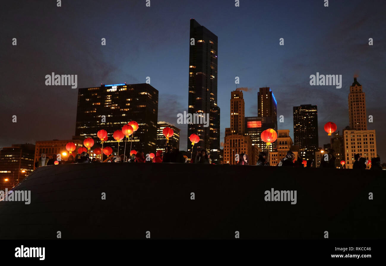 (190210) -- CHICAGO, Feb. 10, 2019 (Xinhua) -- People participate in a lantern procession to celebrate the Chinese Lunar New Year in Chicago, the United States, on Feb. 9, 2019. Citywide celebrations of the Chinese Lunar New Year continued in Chicago on Saturday, with a special lantern procession and lion dance attracting hundreds of citizens. A special event called 'Lantern Celebration' was co-organized by the Art Institute of Chicago (AIC), the Chinese Fine Arts Society and Maggie Daley Park. Attendees learned how to make Chinese lanterns, watched lion dance, joined a lantern procession, and Stock Photo