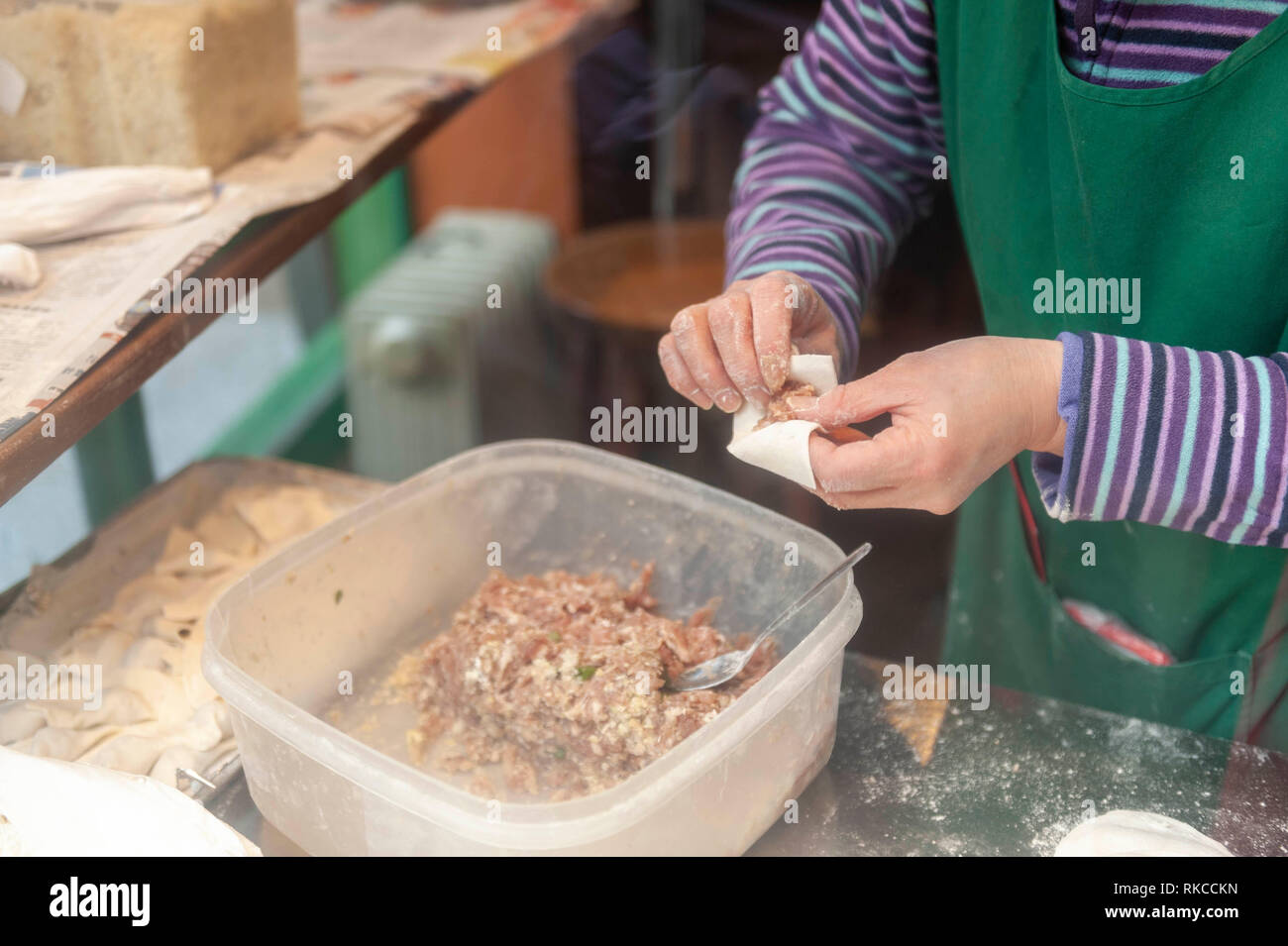 London, UK. 10th Feb, 2019. Chinese dumplings being prepared near Leicester Square in London, England, UK., during Chinese New Year celebrations. Credit: Ian Laker/Alamy Live News. Stock Photo