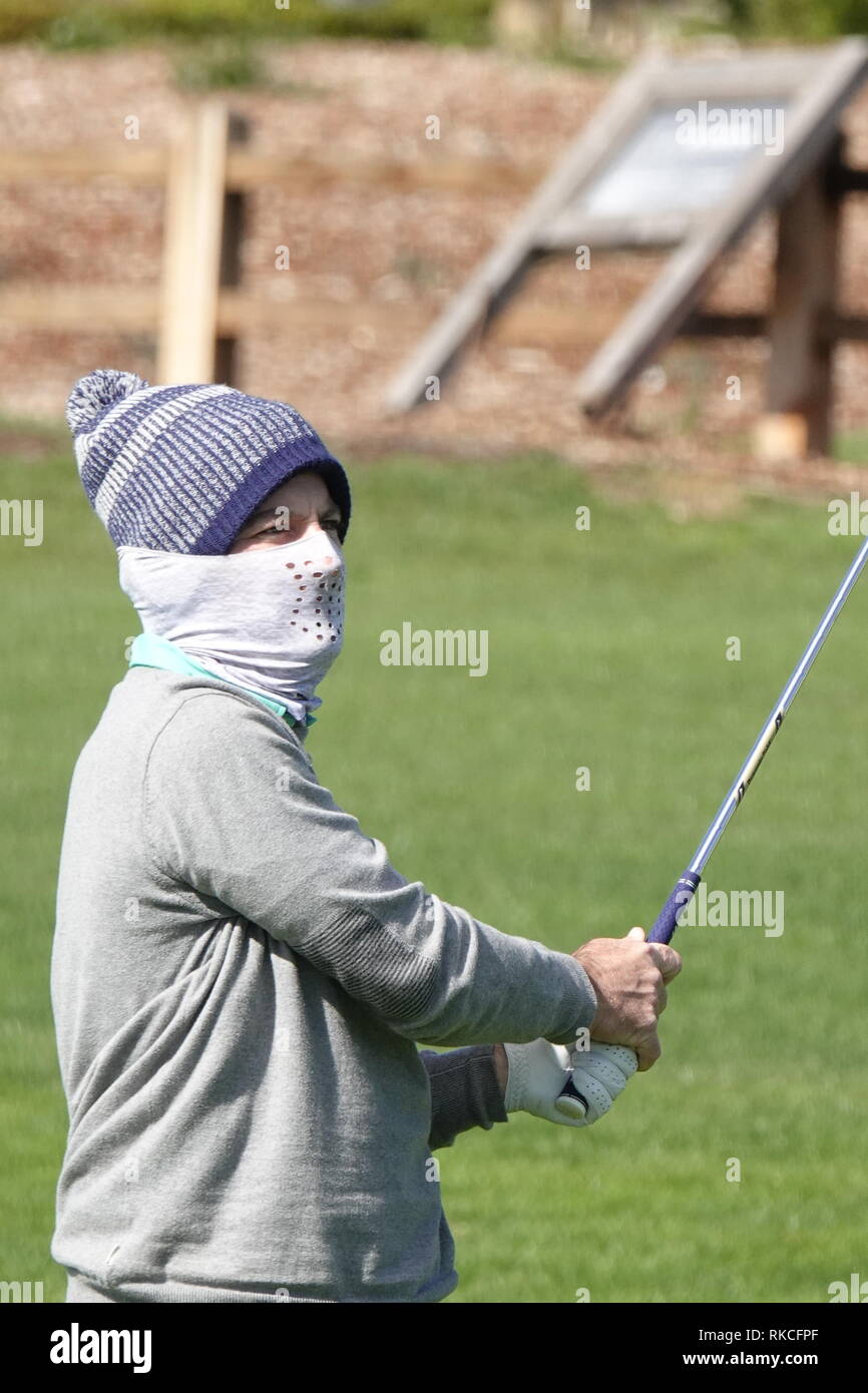 Pebble Beach, California, USA. 10th Feb, 2019. 10th February, 2019 Pebble  Beach Golf Links, CA, USA Matt Every wraps up against the cold during the  final round at Pebble Beach Golf Course