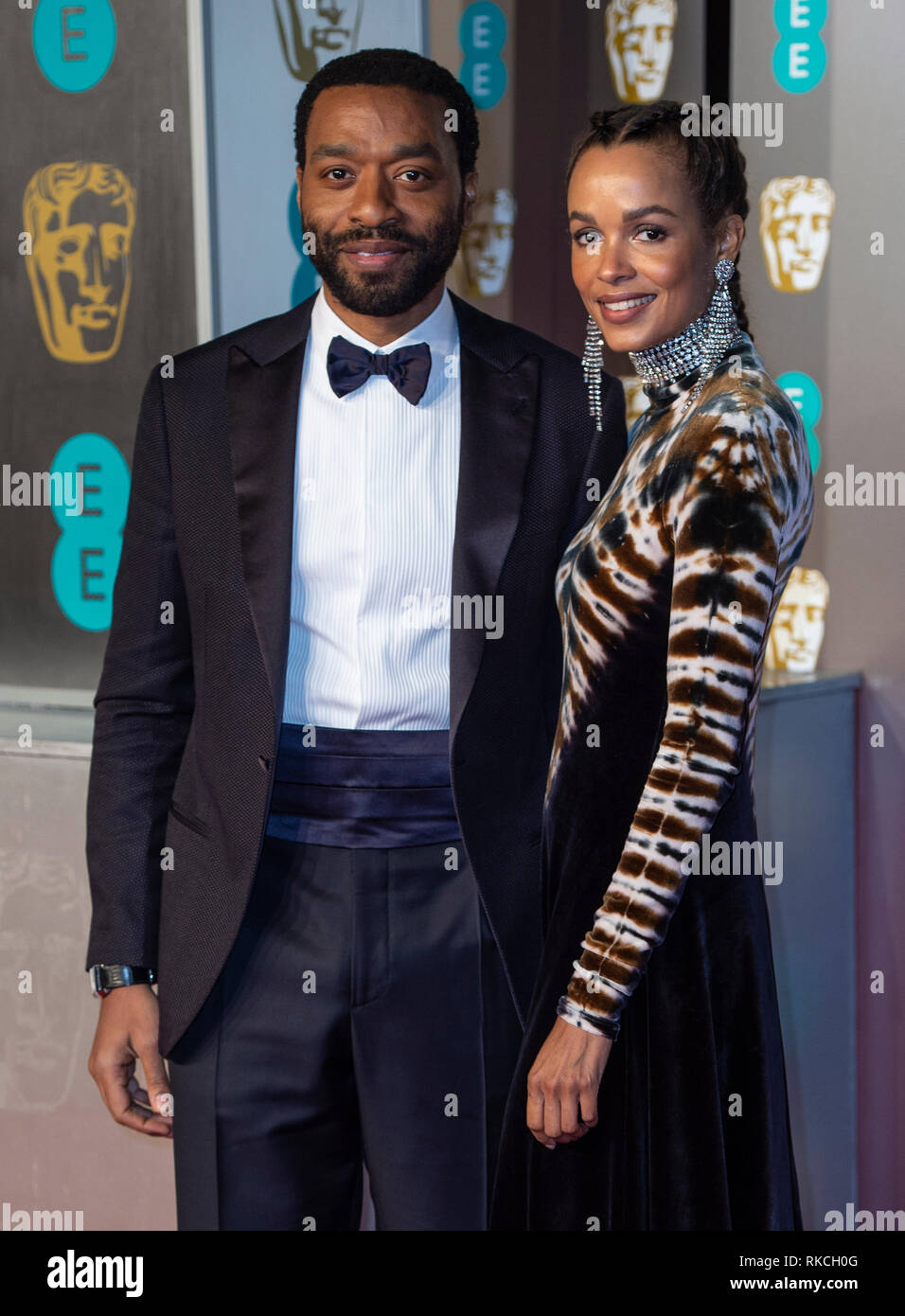 London, UK. 10th Feb, 2019. Chiwetel Ejiofor and Frances Aaternir attends the EE British Academy Film Awards at the Royal Albert Hall, London, England on the 10th February 2019 Credit: Gary Mitchell, GMP Media/Alamy Live News Stock Photo
