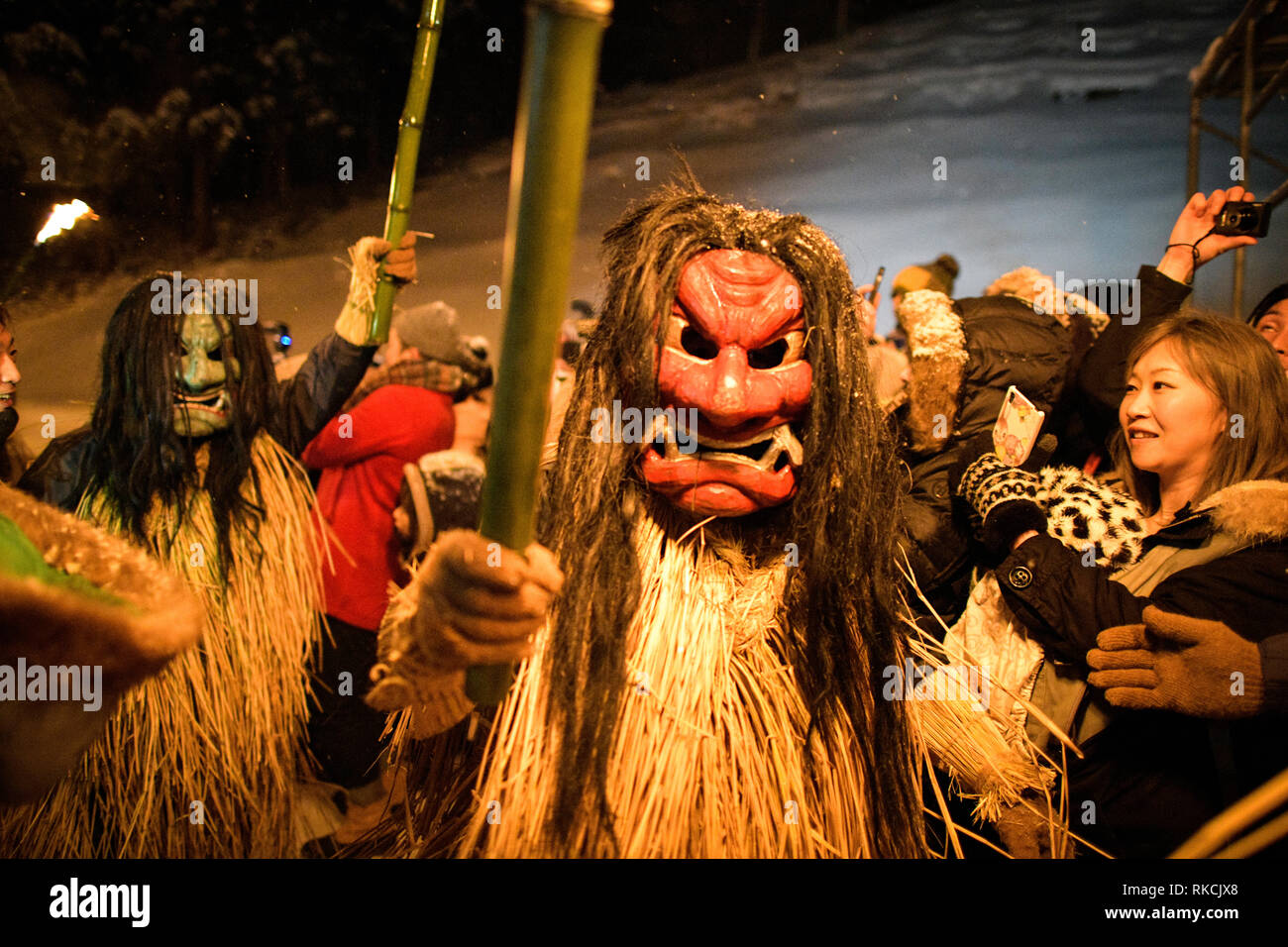 OGA, JAPAN - FEBRUARY 10: Men dressed in straw clothes and orge masks as Namahage, or mountain demons, march down from a snow mountain with flaming torches during the Namahage Sedo Festival at Shinzan Shrine on February 10, 2019 in Oga, Akita prefecture, Japan. (Photo by Richard Atrero de Guzman/Aflo) Credit: Aflo Co. Ltd./Alamy Live News Stock Photo