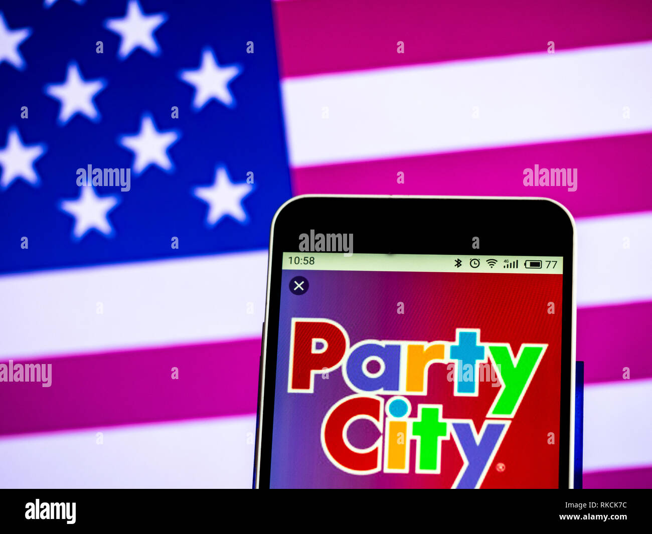 Party City Retail chain company logo seen displayed on a smart phone