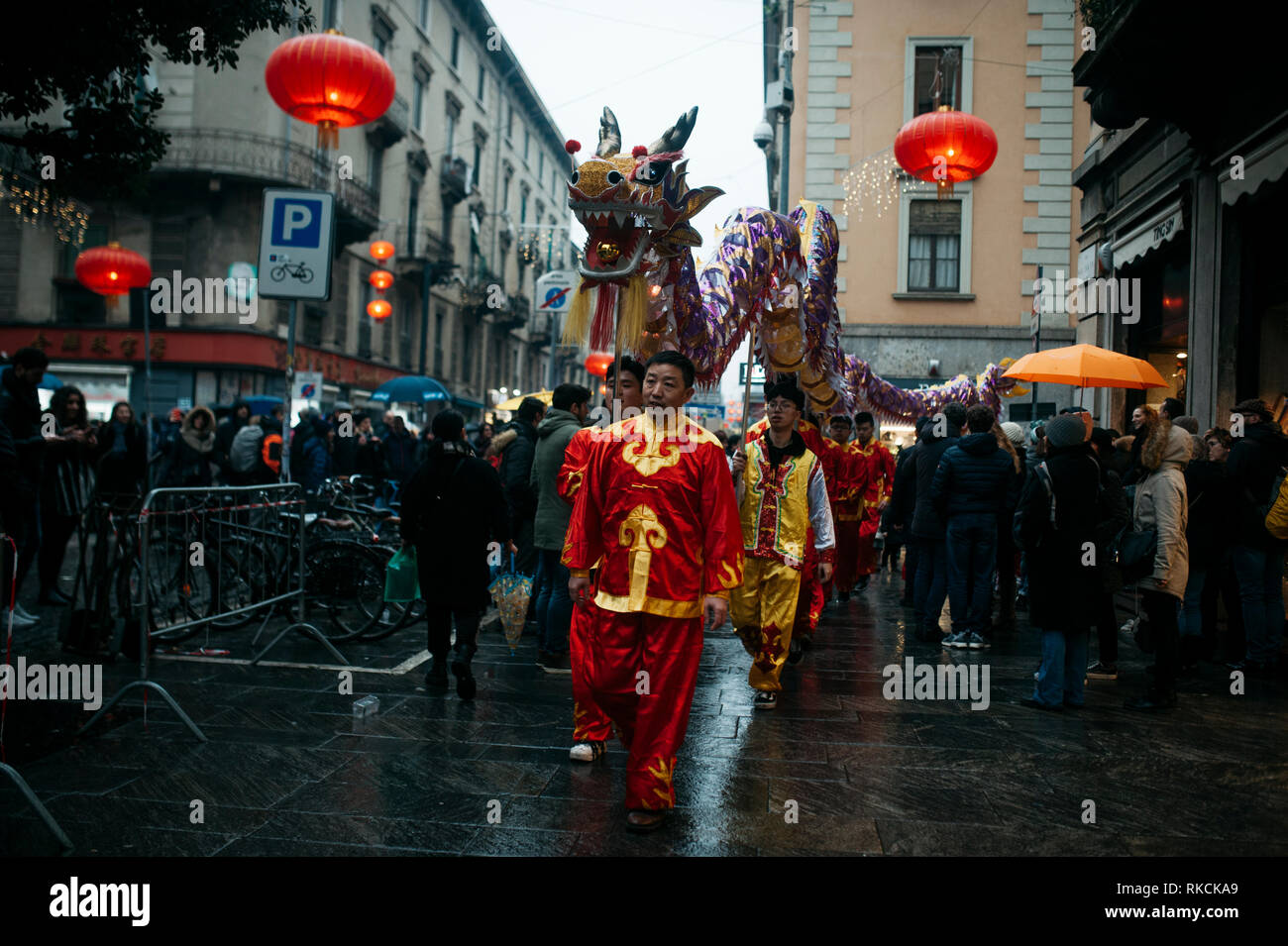 Performers are seen going back to the Chinese Cultural Center during the parade. The Chinese community in Milan celebrates the New Year with colourful parades, Golden Dragon Parade and the Chinese lion dance. According to the Chinese Zodiac, the New Year is dedicated to the pig; so banners and cards depicting the pig decorated Via Sarpi and its neighbourhoods, also known as Milan’s Chinatown. Giuseppe Sala, Mayor of Milano, and Mauro Boselli, Head of the Chamber of the Italian Fashion also attended the event. Stock Photo