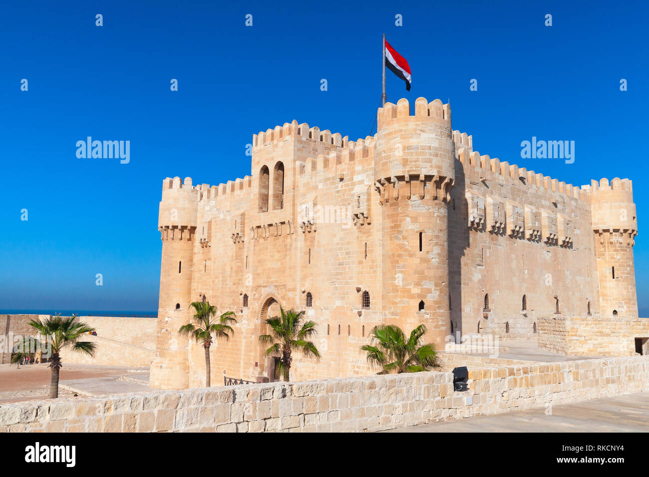 The Citadel of Qaitbay or the Fort of Qaitbay is a 15th-century defensive fortress located on the Mediterranean sea coast, Alexandria, Egypt. It was e Stock Photo