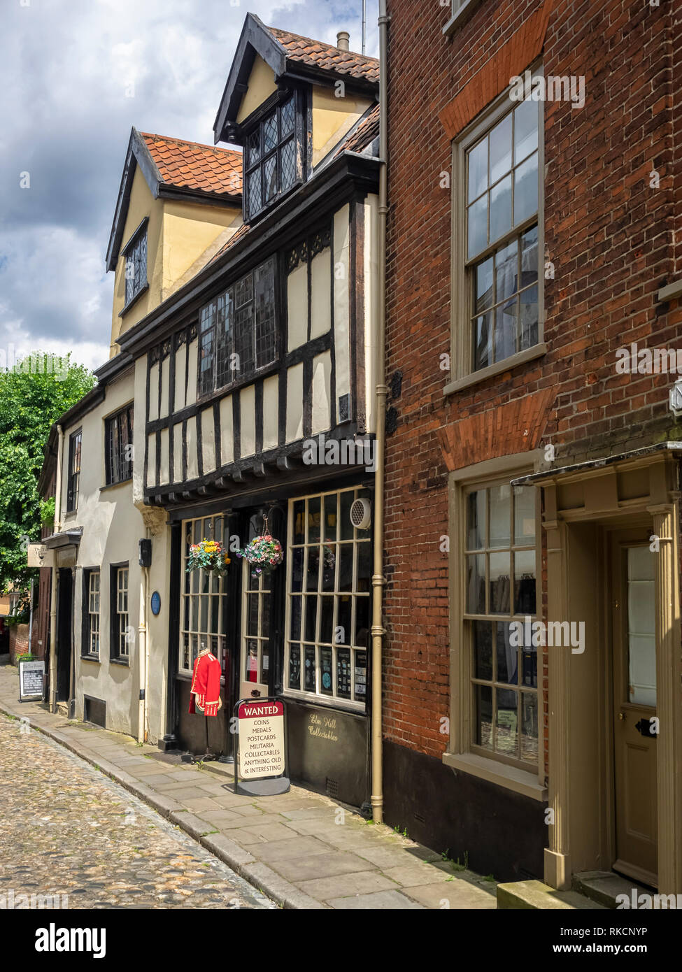 NORWICH, NORFOLK, UK - JUNE 13, 2018:  View along Elm Hill, a cobbled lane in the City Centre Stock Photo