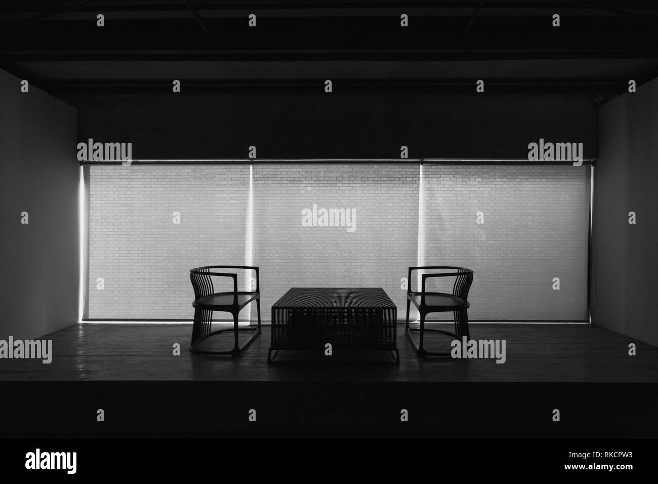 Two Black and White Dramatic Chairs Seating Meeting Decision Important Together Small Table Spotlight Empty Nobody Stock Photo