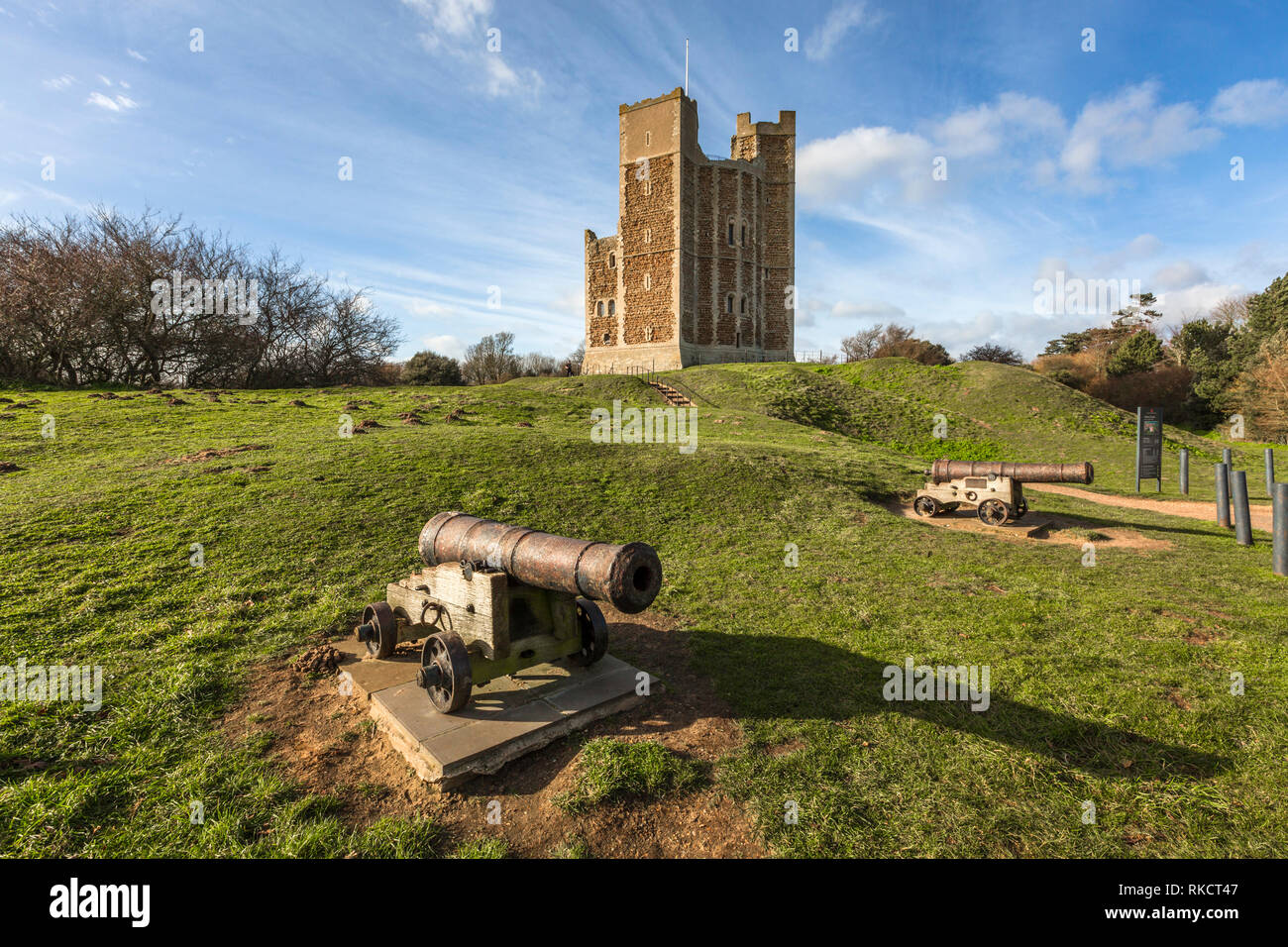 12th century Orford castle, Orford, Suffolk, UK, with two C1800 cannon. Stock Photo