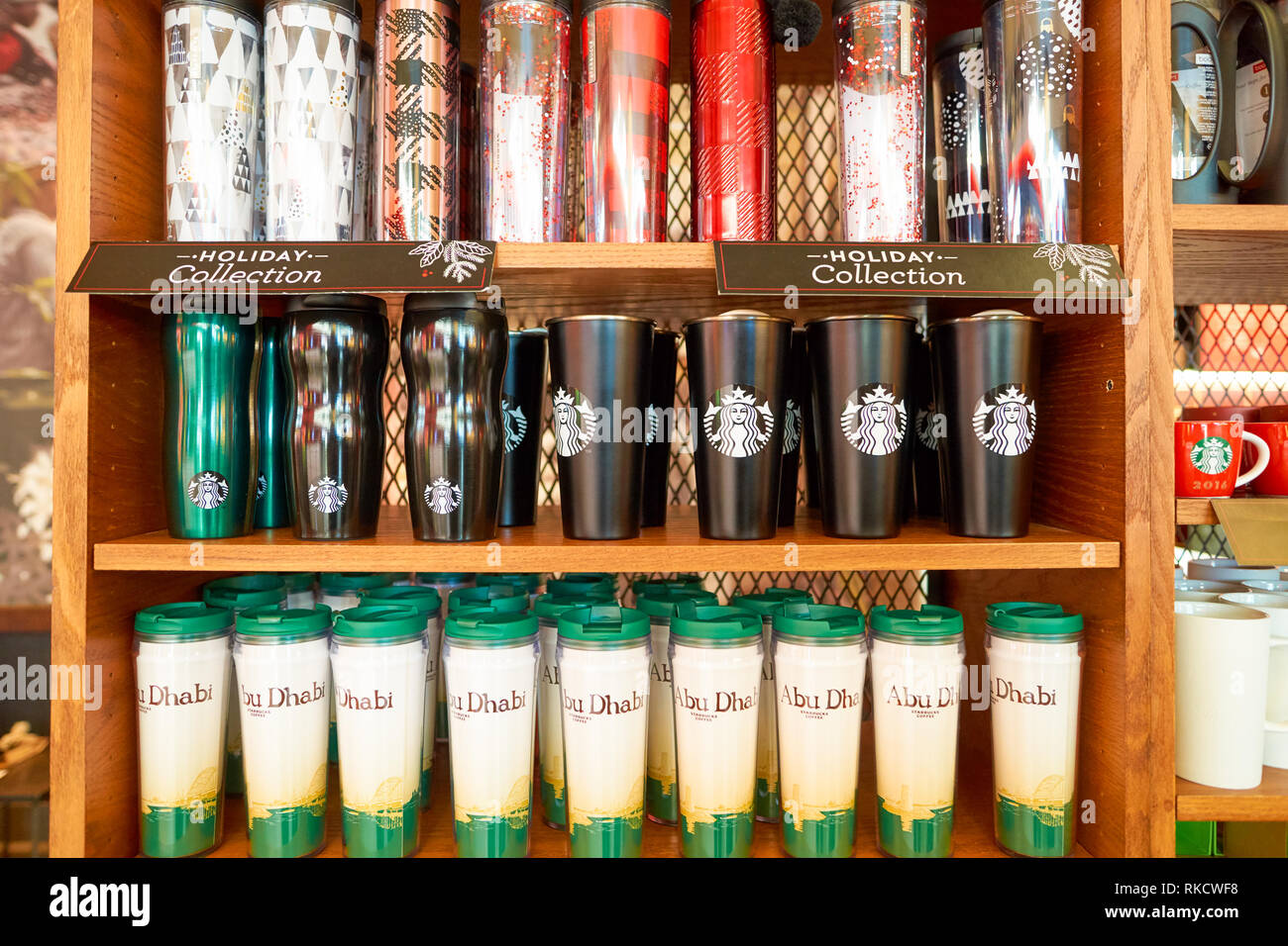 DUBAI CIRCA NOVEMBER, 2016 shelves with cups at a Starbucks cafe in