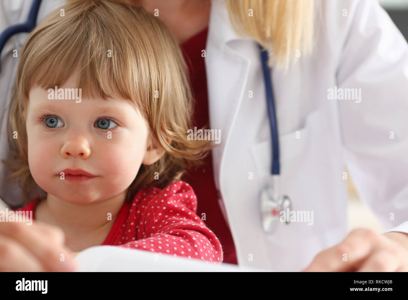 Little child at pediatrician reception Stock Photo Alamy