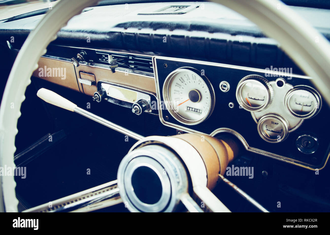 Vintage car dashboard and steering wheel Stock Photo