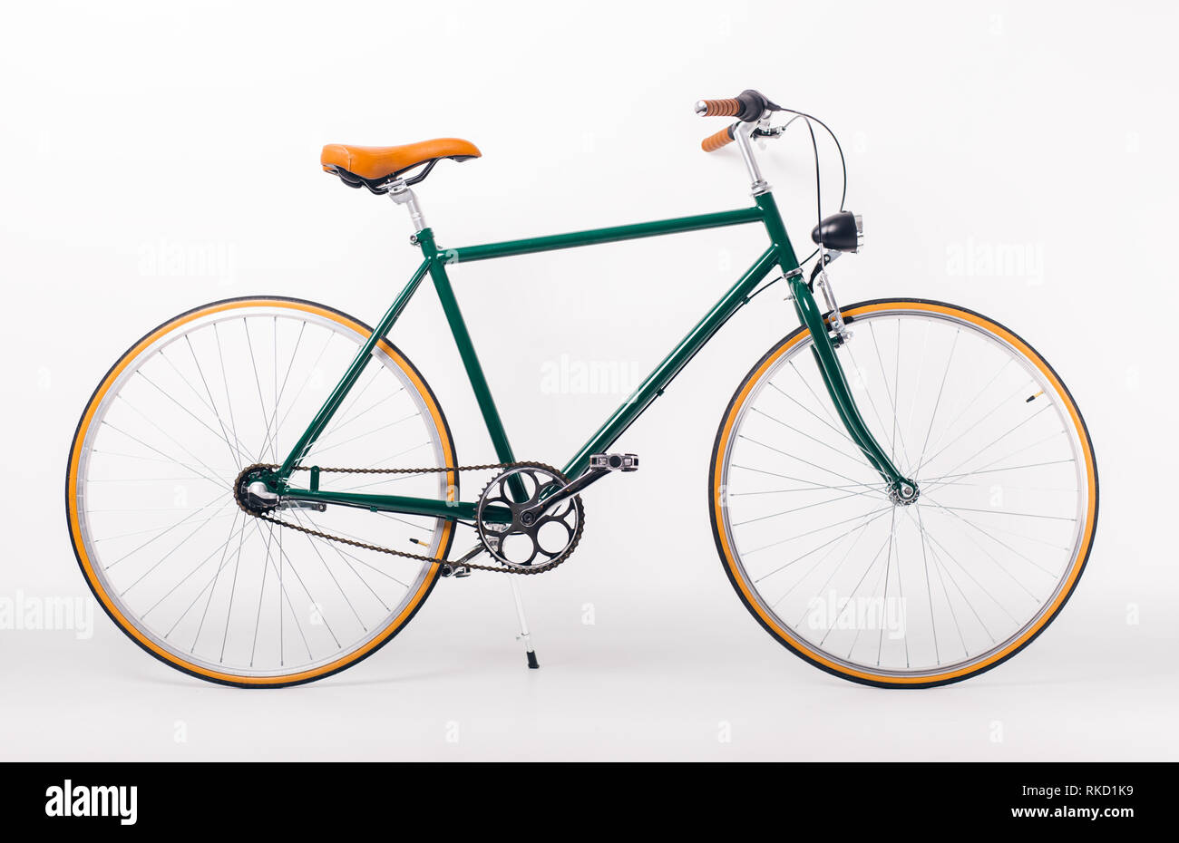 Bicycle on white background. Studio shot of retro styled bicycle Stock Photo