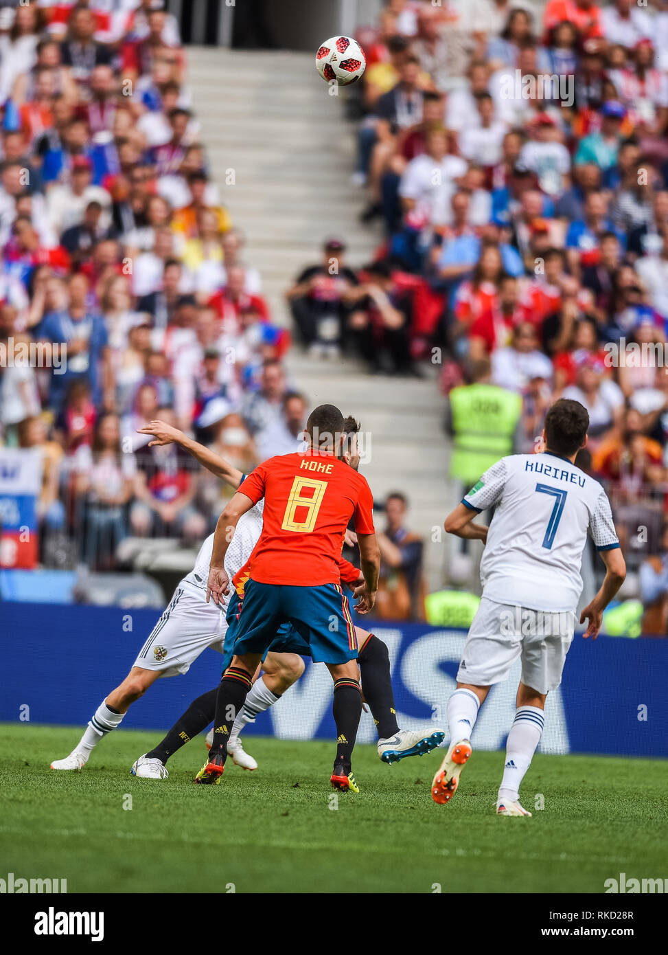 Moscow, Russia - July 1, 2018. Spain national football team players Gerard Pique and Koke against Russia players Daler Kuziaev and Alexander Golovin d Stock Photo