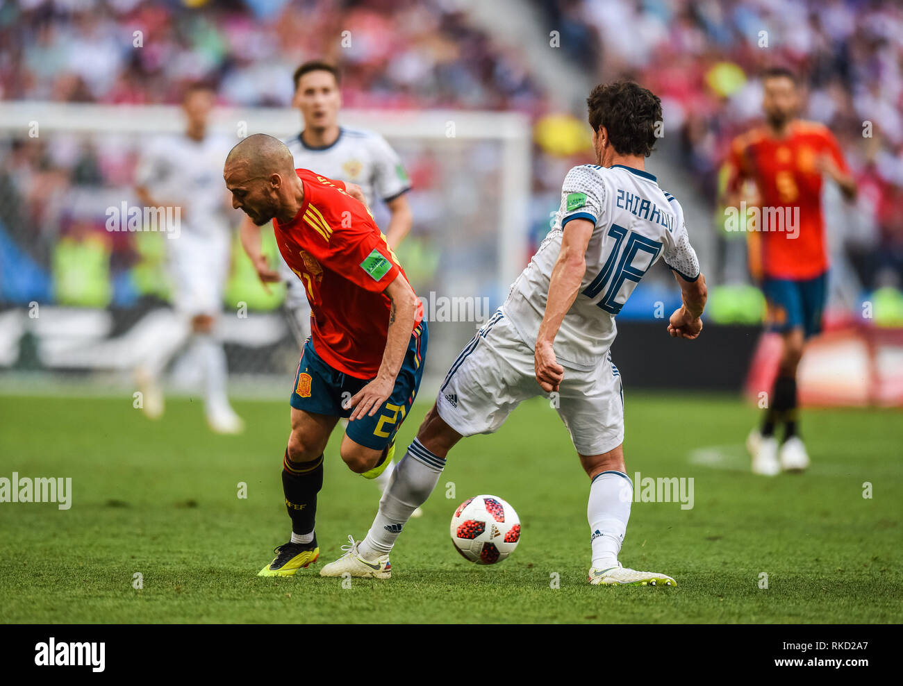 Moscow, Russia - July 1, 2018. Spain national football team midfielder David Silva against Russia midfielder Yury Zhirkov during FIFA World Cup 2018 R Stock Photo